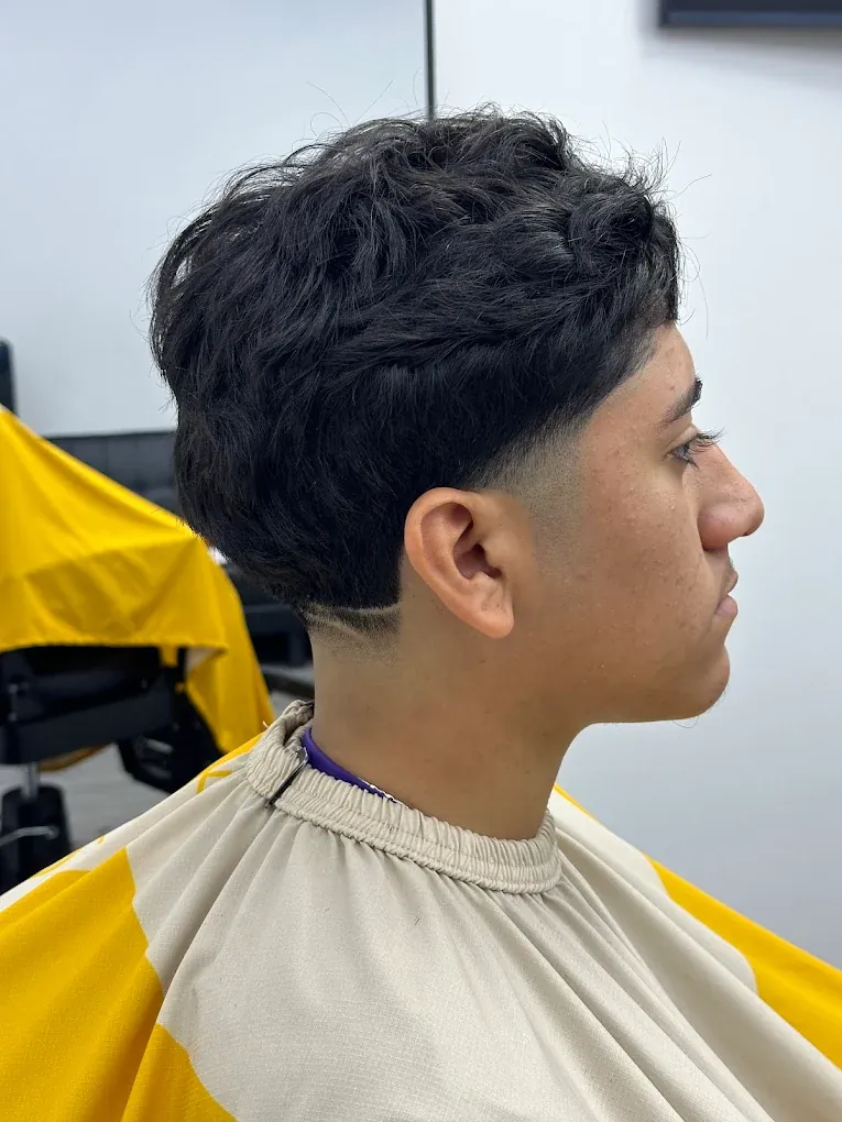 Precision fade and lineup work by the barbers at Blends Barbershop in Denham Springs